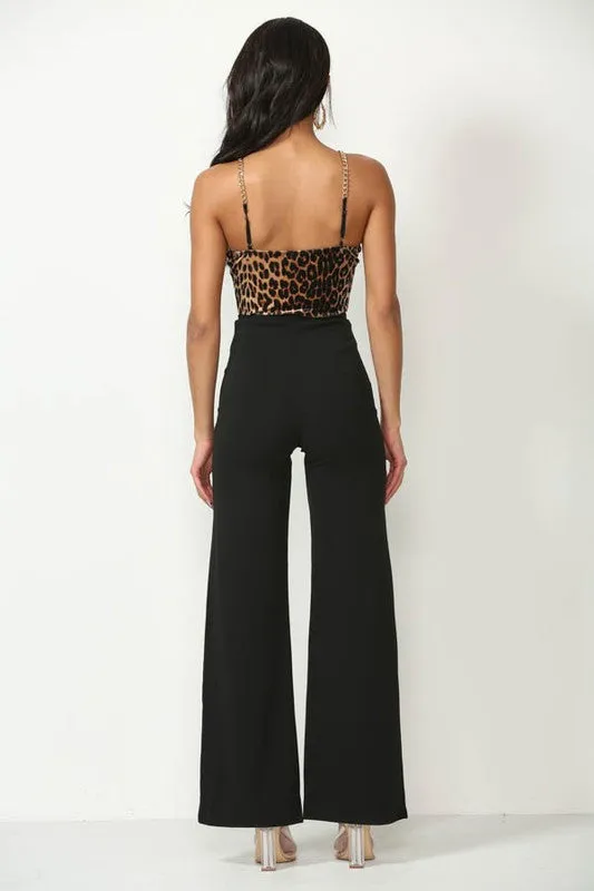 Black Solid, Full Length Pants In A Flare Style With A High Waist, And Wide Legs