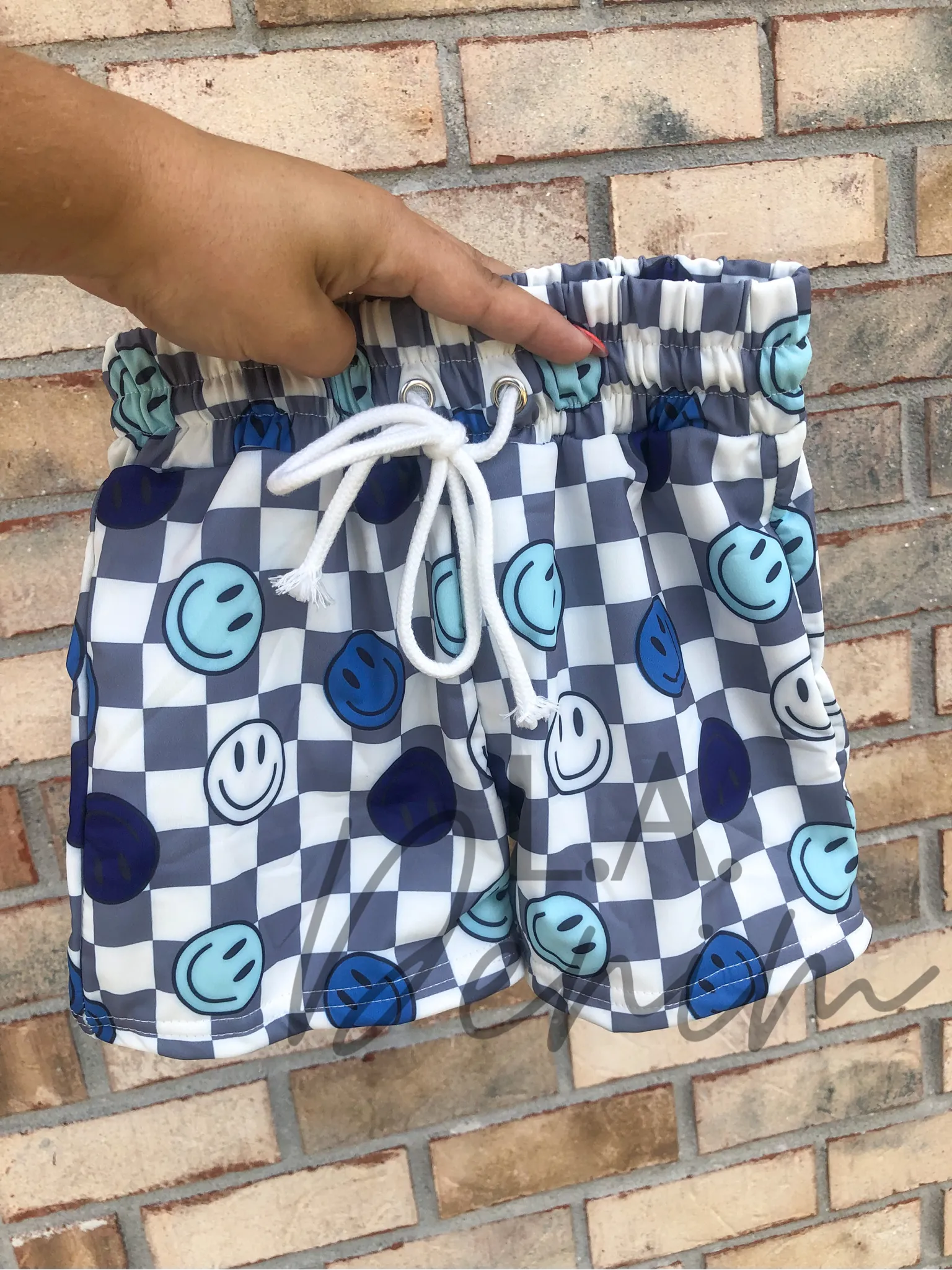 Checker Smiles Swim Trunks