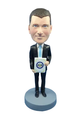 Man in Suit Receiving an Award